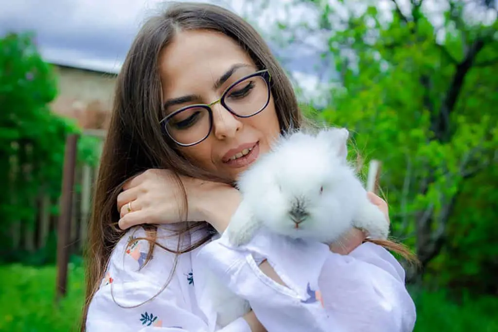 Image of woman with pet bunny